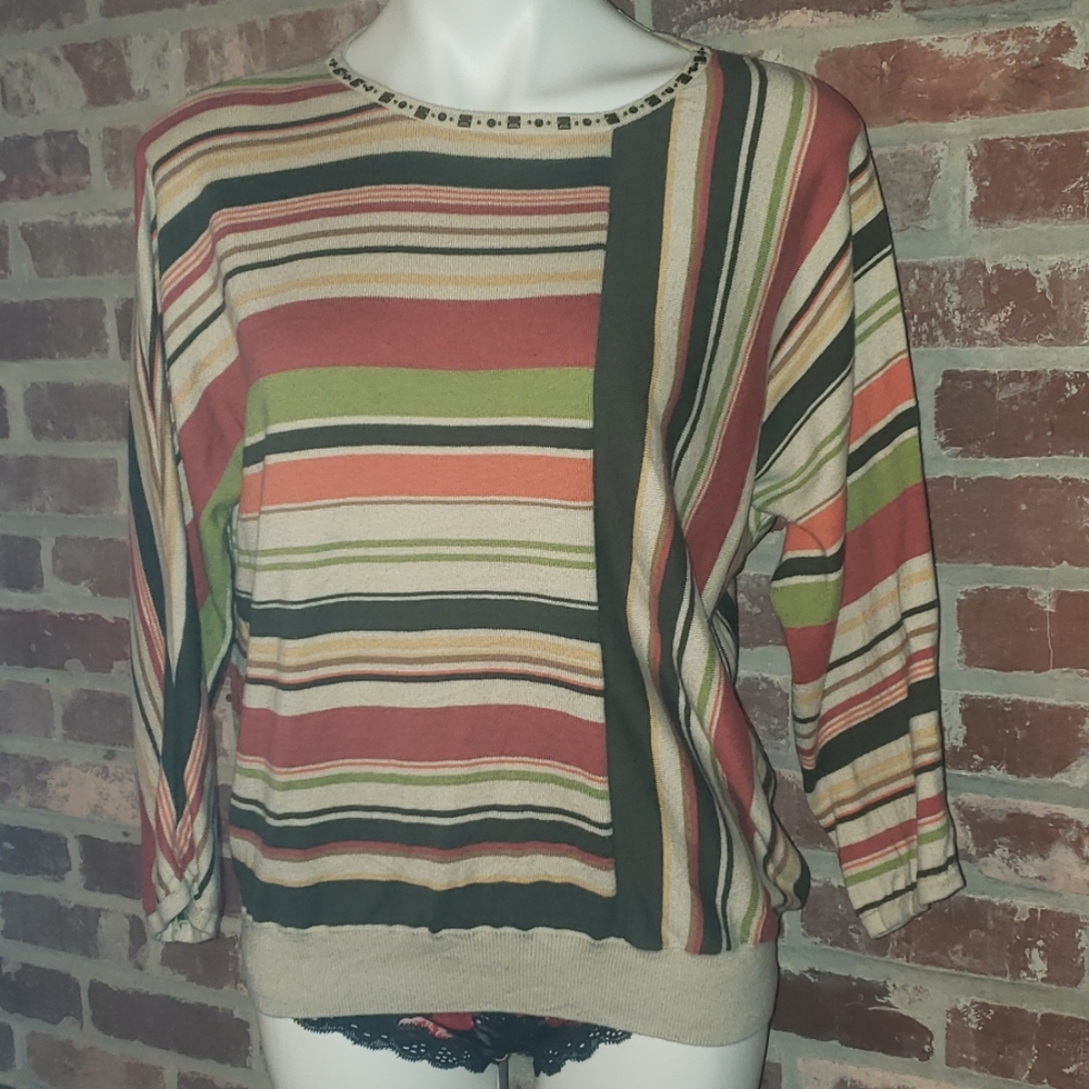 Three quarter inch sleeve sweater. Gently used.